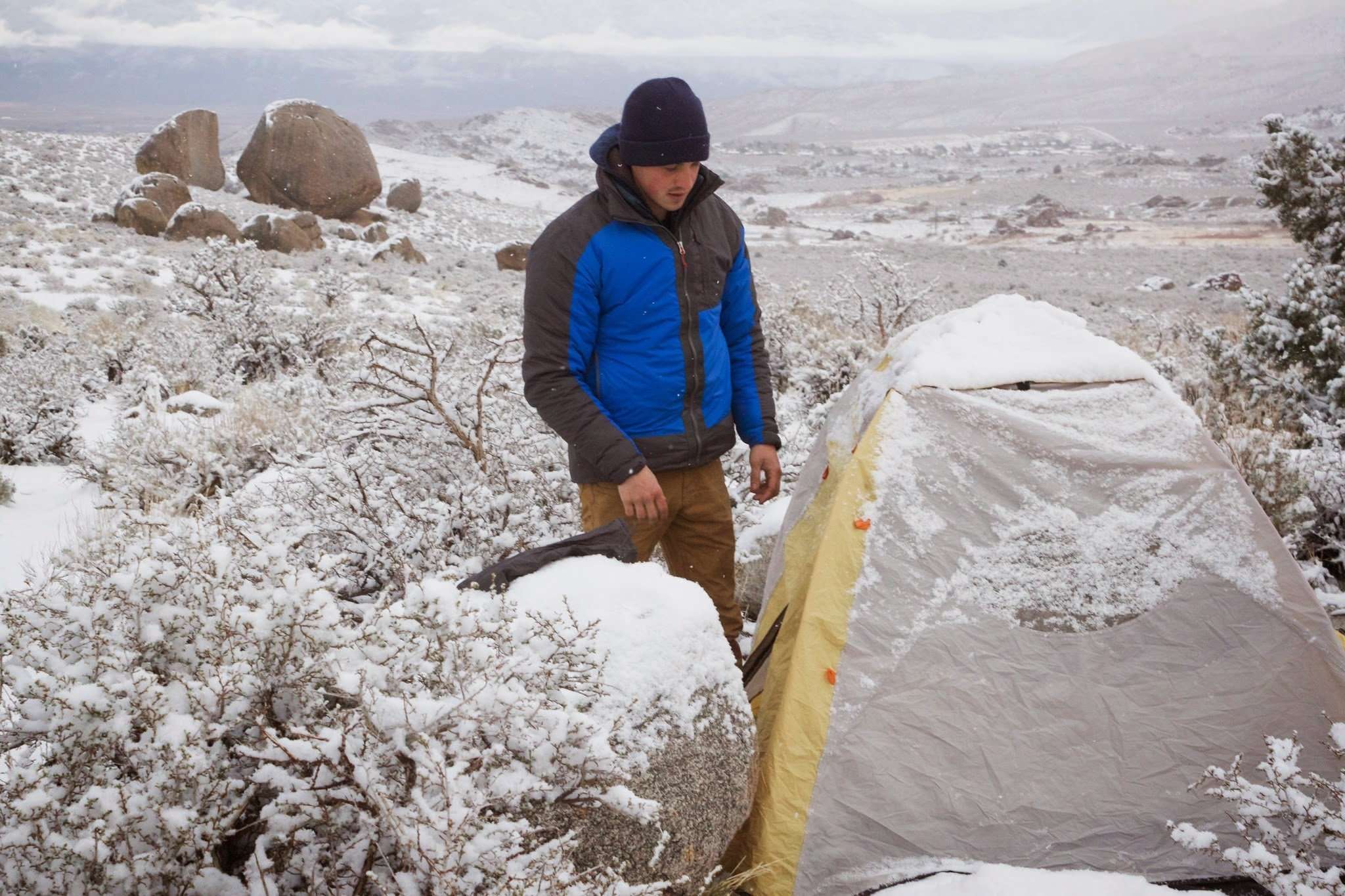 Alex, with his snow capped project in the background.